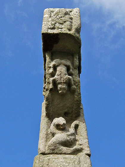 Drumcliffe Cross in
    Sligo, from c. 11th century, seemingly showing a frog carved in the stone