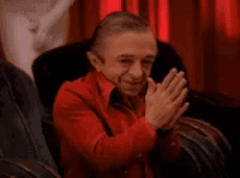 The Arm from Twin Peaks rubbing his hands together mischeviously mischief